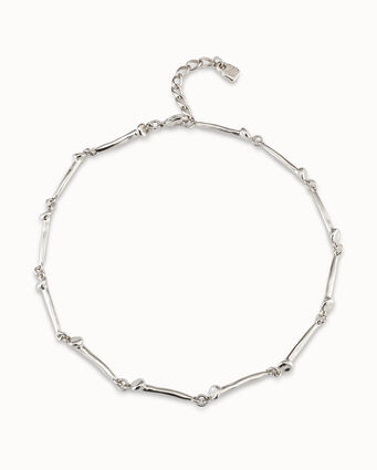 Sterling silver-plated necklace with nail-shaped pieces.