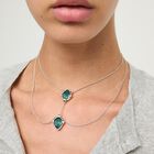 Double necklace with two drop-shaped pendants featuring blue faceted crystals