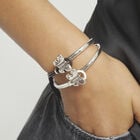 White leather bracelet with butterfly ornament