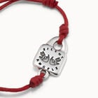 Leather bracelet with links and topaz