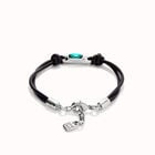 Leather bracelet with a green crystal