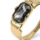 Rigid bracelet with a rectangular grey faceted crystal