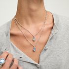 Double necklace with two blue drop-shaped faceted crystals