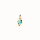 Charm with red stone
