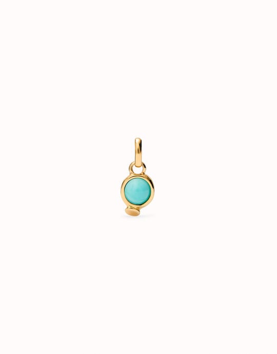 Charm with red stone