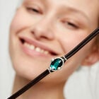 Leather bracelet with green oval faceted crystal