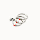 Triple ring with red crystals