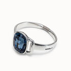 Bangle bracelet with a big blue crystal