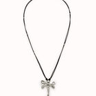 Long pendant necklace with a dragonfly