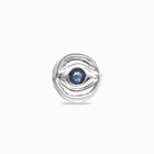 Eye-shaped ring with faceted blue crystal
