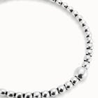 Beaded short necklace with larger central bead