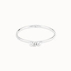 Pulsera r&iacute;gida ba&ntilde;ada en plata con topacios