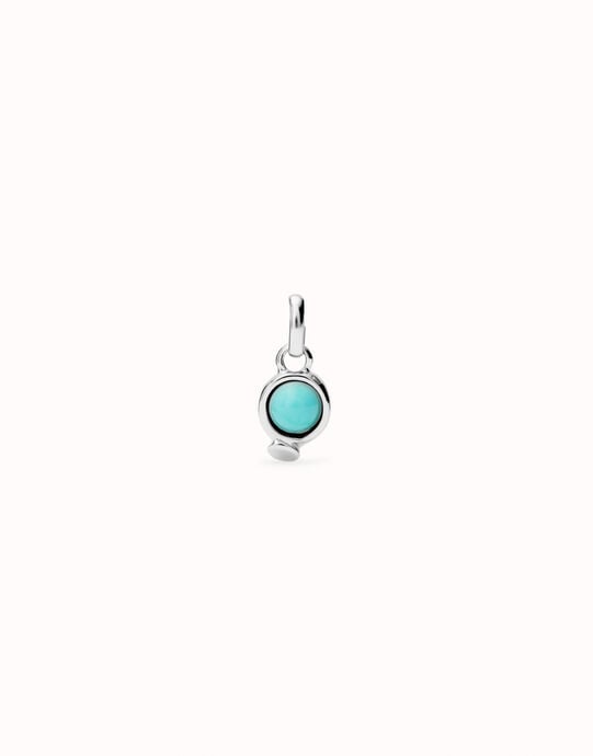 Charm with red stone