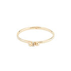 Pulsera r&iacute;gida ba&ntilde;ada en oro con topacios