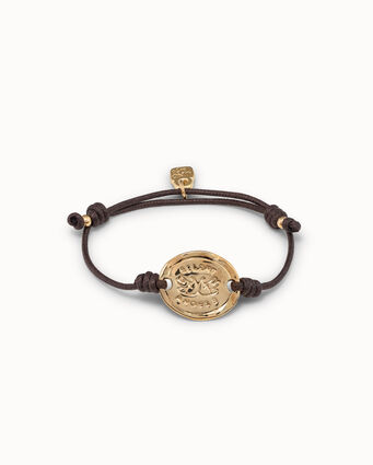 Pulsera Solidaria con placa bañada en oro de 18K