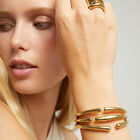 Bangle bracelet with multiple intertwined organic shapes