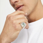 Eye-shaped signet ring with faceted green crystal