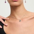 Necklace with a green drop-shaped faceted crystal