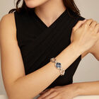 Link chain bracelet with a blue crystal