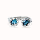 Bangle bracelet with two blue crystals