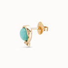 Arete individual ba&ntilde;ado en oro de 18k y un cristal azul