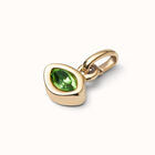 Charm with green crystal
