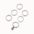 Multi row ring with a charm