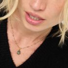 Necklace with a grey drop-shaped faceted crystal