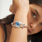 Semi-rigid bracelet with blue faceted crystal