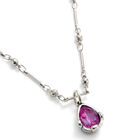 Necklace with a pink drop-shaped faceted crystal