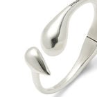 Bangle bracelet with rounded shapes