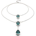 Double necklace with three drop-shaped pendants featuring green faceted crystals
