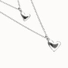 Multi strand chain necklace with two hearts