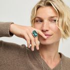 Rectangular ring with a green faceted crystal
