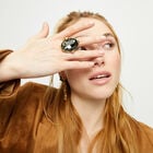 Large ring with oval faceted gray crystal