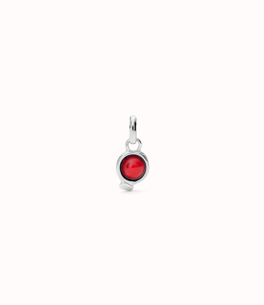 Sterling silver-plated charm with red stone.