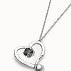 Long chain pendant necklace with a large heart