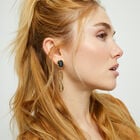 Drop earrings with faceted black crystal and links