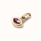 Charm with pink crystal