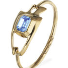 Semi-rigid bracelet with blue faceted crystal