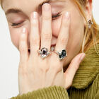 Ring with pink oval faceted crystal