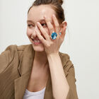 Large ring with blue oval faceted crystal