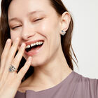 Eye-shaped stud earrings with blue crystal