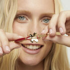 Red leather bracelet with butterfly ornament