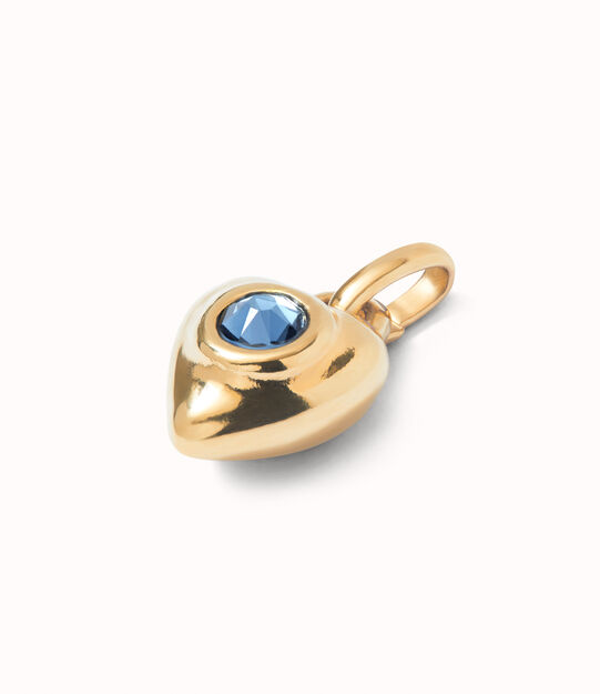 Charm bañado en oro 18k con cristal azul.