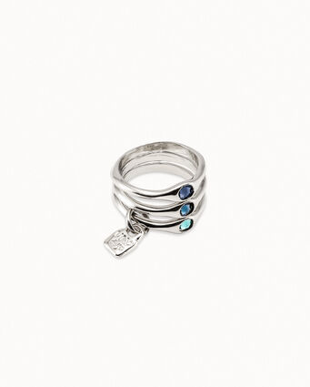 Sterling silver-plated triple ring with blue crystals.