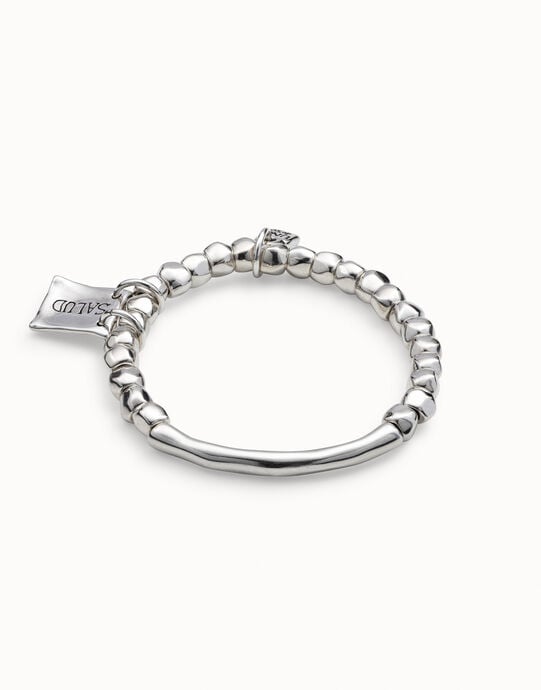 Beaded stretch bracelet with tubular piece and charms, , large
