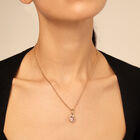 Charm with a pink crystal