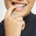 Ring with four intertwined organic shapes