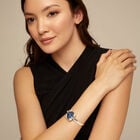 Pulsera r&iacute;gida ba&ntilde;ada en plata de ley con cristal azul